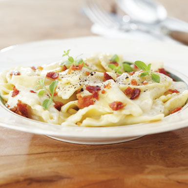 Ravioli Funghi i cremet hvidvinssauce
